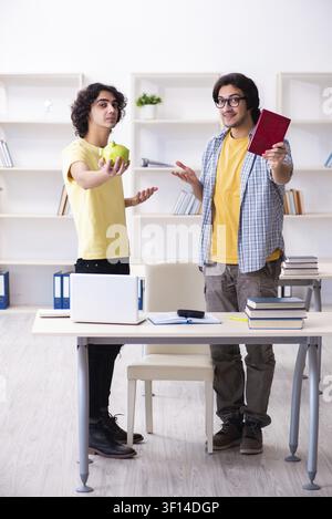 Two male students in the classroom Stock Photo