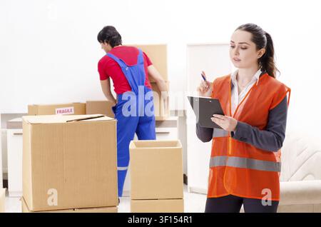 Professional movers doing home relocation Stock Photo
