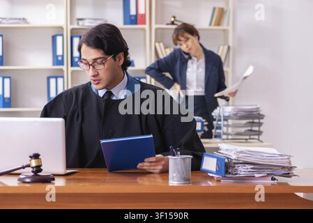 Two lawyers working in the office Stock Photo
