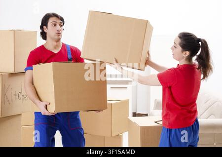Professional movers doing home relocation Stock Photo