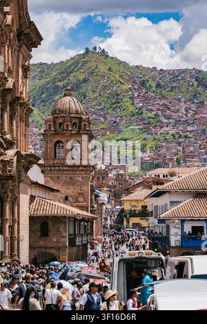 Cusco, Peru - March 23, 2025: Cusco cityscape with historic churches and mountain side neighborhoods. Stock Photo
