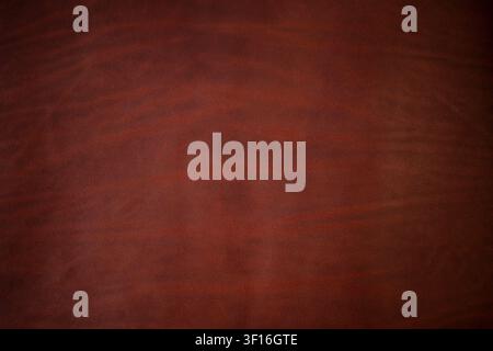 Dark Red Leather Texture Background with Vignette Stock Photo