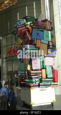 Tall Stack Colorful Suitcase Art Installation Shopping Mall Large Clear Glass Window Display Stock Photo