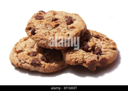 Close-up of three chocolate chip cookies/chocolate chip biscuits isolated in white background. Concept: dessert, sweet, delicious, bakery, pastry Stock Photo