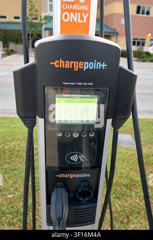 FARMERS BRANCH, TX, USA - JULY 10, 2026: Close-up of a ChargePoint electric vehicle charging station displaying operational information and equipped w Stock Photo