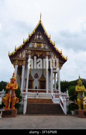 Main Thai Buddhist Shrine White Wall Gilded Gable Two Giant Gold Yellow Guardian Statues Stone Stairs Stock Photo