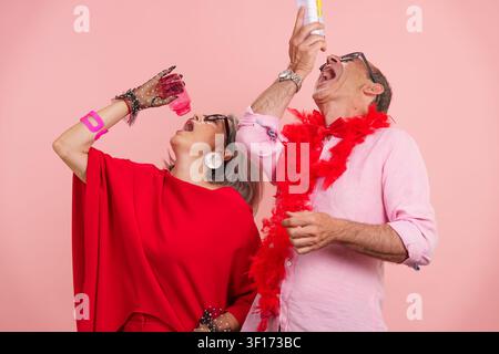 Older couple enjoying active longevity with supplements Stock Photo