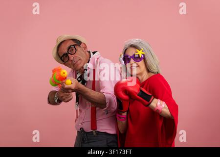 Senior couple sharing playful moment having fun together Stock Photo