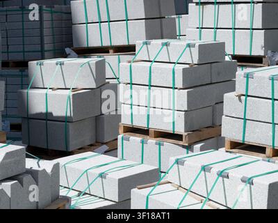 Concrete blocks stacked and stored at construction site Stock Photo