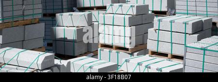 Concrete blocks stacked and stored at construction site Stock Photo