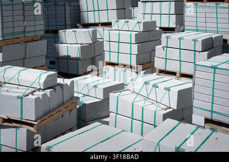 Concrete blocks stacked and stored at construction site Stock Photo