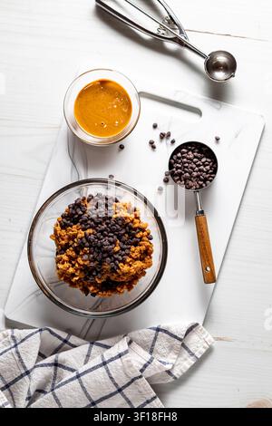 Ingredients for making peanut butter chocolate chip energy balls. Stock Photo
