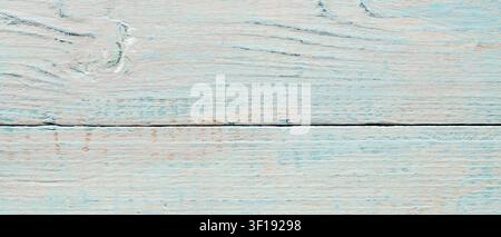 Weathered painted wood texture with peeling turquoise blue paint on rustic surface Stock Photo
