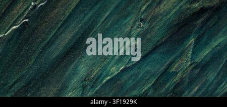 Dark teal and green oil paint texture with gold bronze streaks for abstract background Stock Photo