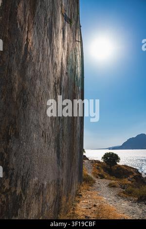 vertical wall photographed from the bottom of a rock cliff Stock Photo