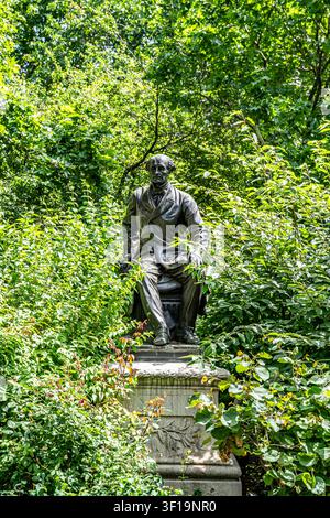 Bronze statue of John Stuart Mill, British philosopher and economist, by sculptor Thomas Woolner, in Temple Gardens, Victoria Embankment, London, UK. Stock Photo