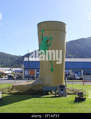 The Golden Gumboot monument, featuring a large green tree frog, located alongside the highway in Tully, Far North Queensland, Australia Stock Photo