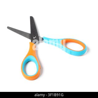 Childrens safety scissors with blunt metal blades and colorful orange and blue plastic handles, isolated on a white background Stock Photo