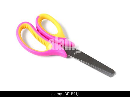 Pink and yellow childrens safety scissors with blunt metal blades for crafting and school projects, isolated on a white background Stock Photo