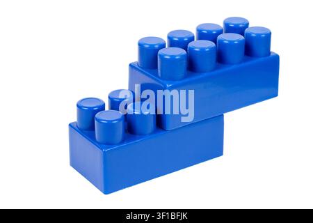 Two connected blocks of children's construction set. Blue details of the constructor Stock Photo