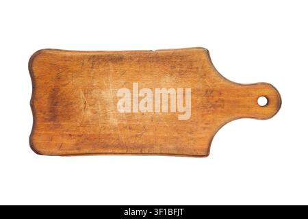 Antique wooden cutting board on a white background. The old cutting board is isolated. Stock Photo