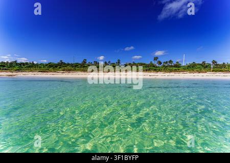 Abstract glitch-style collage blending tropical Florida Keys beach scenery with fragmented digital overlays, creating a surreal composition Stock Photo