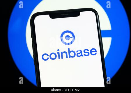 Paris, France - July 12, 2026: The blue Coinbase cryptocurrency exchange logo shown on a mobile screen. Stock Photo