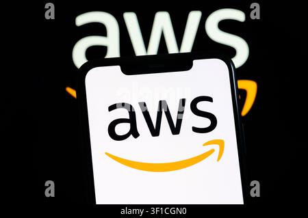 Paris, France - July 12, 2026: The AWS Amazon Web Services logo on a dark mobile phone screen. Stock Photo