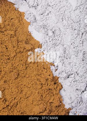 Kinetic sand texture brown and gray color with diagonal border close-up top view Stock Photo