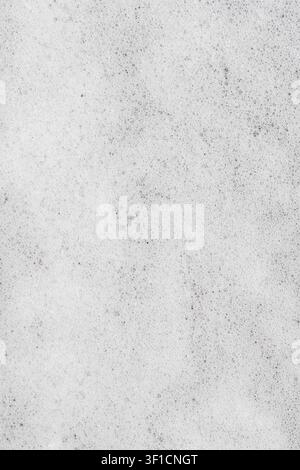 Full frame texture of dense white soap foam with many small bubbles. Stock Photo