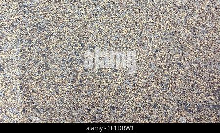Beige gravel texture close up Stock Photo