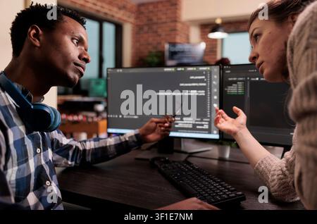 Engineers build machine learning code, programming engineers developing machine learning algorithm in order to sustain system security stability. Stock Photo