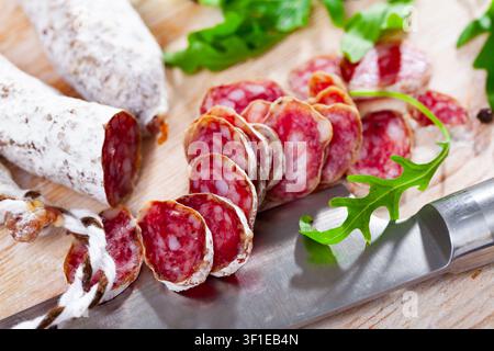 Sliced spanish sausage fuet Stock Photo