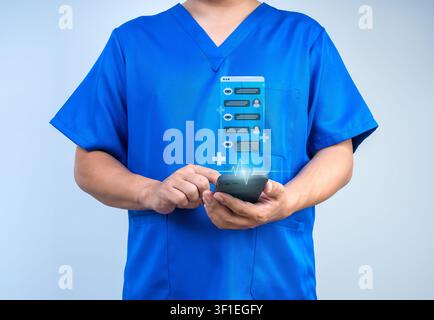 Doctor using smartphone with AI healthcare chatbot interface for digital health, telemedicine, patient communication, medical technology, remote consu Stock Photo