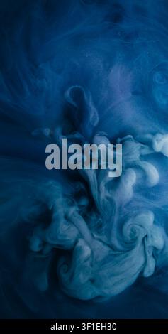 Cloud ink splash. Smoke texture. Dark blue cosmic flow wave swirling paint mist. Mystic stream blur puff explosion abstract background. Stock Photo