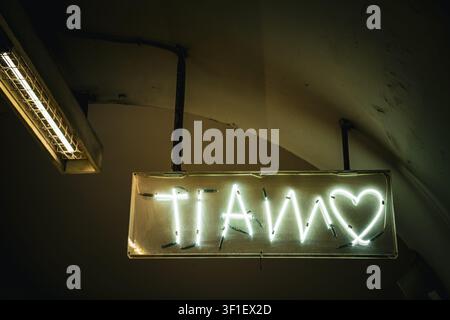 TI AMO Italian Neon Light Sign in Rome Subway Station, Italy Stock Photo