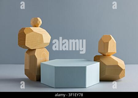 Geometric Wooden Sculptures with Hexagonal Pedestal on Minimalist Background for Modern Decor Stock Photo