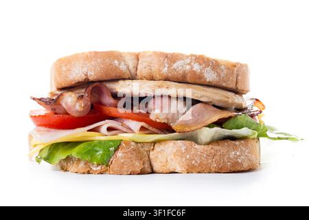 Grilled Club Sandwich with Chicken, Bacon, Cheese and Fresh Vegetables isolated on white background Stock Photo