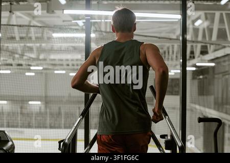Man Exercising on Treadmill in Gym for Fitness Stock Photo