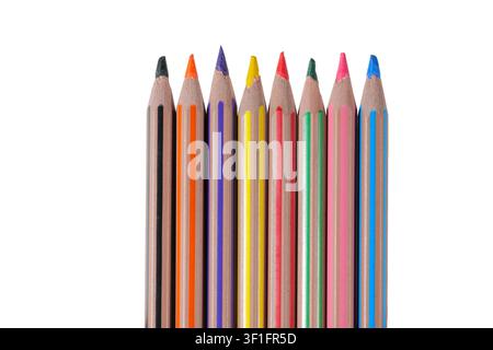 Row of bright multi colored drawing pencils isolated on a clean white background. Stock Photo