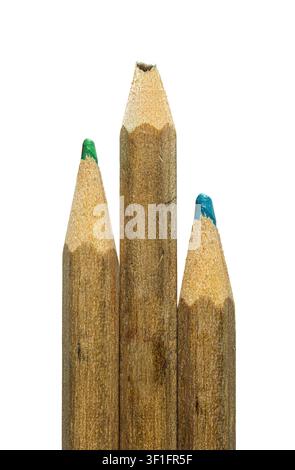 Close up of three used wooden pencils lined up vertically, one green, one blue and one taller unpointed in the center, isolated on a white background Stock Photo