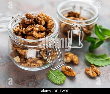 Walnuts without shell on a concrete background Stock Photo