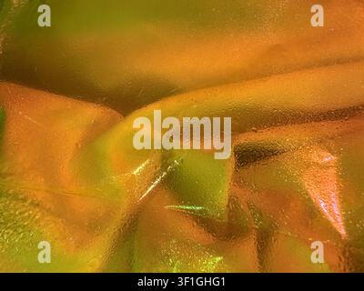 Close up texture with condensation droplets on metallic surface. Smooth, curved shapes and gradient colors create abstract background. Suitable for we Stock Photo