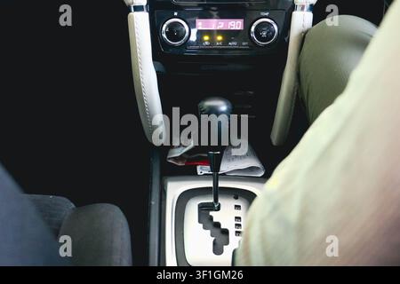 Hand Shifting Automatic Car Gear Lever Close Up Inside Modern Vehicle Stock Photo