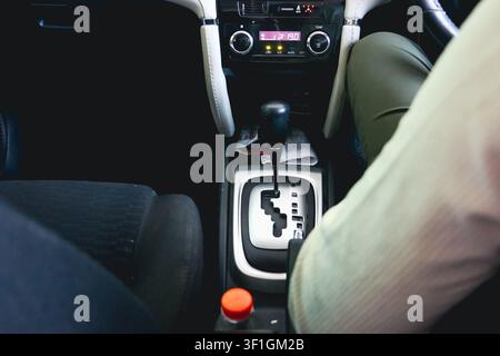 Hand Shifting Automatic Car Gear Lever Close Up Inside Modern Vehicle Stock Photo