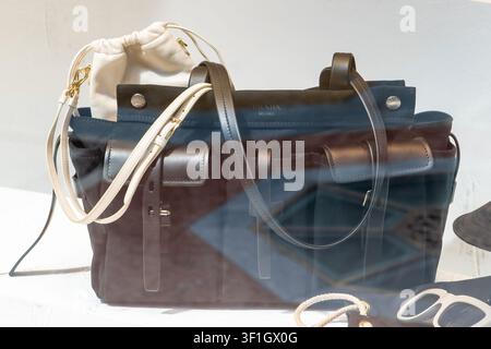 Prada Milano Luxury Fashion Handbag on Display. Black color Fashion modern Bag. Milan, Italy - June 24, 2026 Stock Photo
