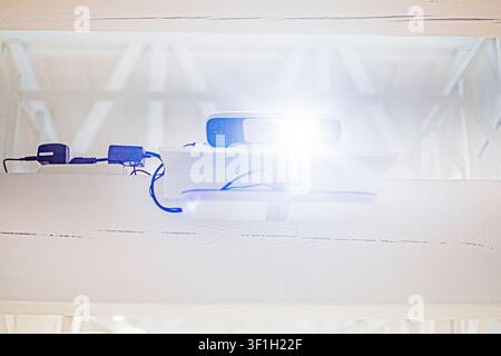Floodlight installation in a light wooden interior Stock Photo