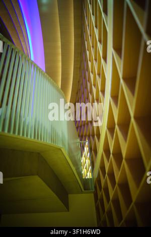 Abstract architectural design featuring geometric patterns and lighting effects. Stock Photo
