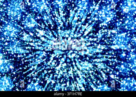 Blue bokeh sparkle burst abstract light background for festive celebration and holiday design Stock Photo