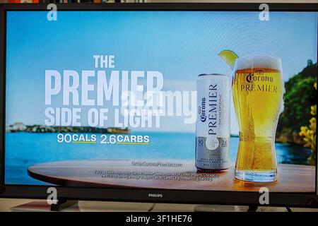 Miami Beach Florida,tv television,screen monitor,commercial ad advertisement,Corona Premier,beer,light beer,alcoholic beverage,beer can,beer glass,pin Stock Photo